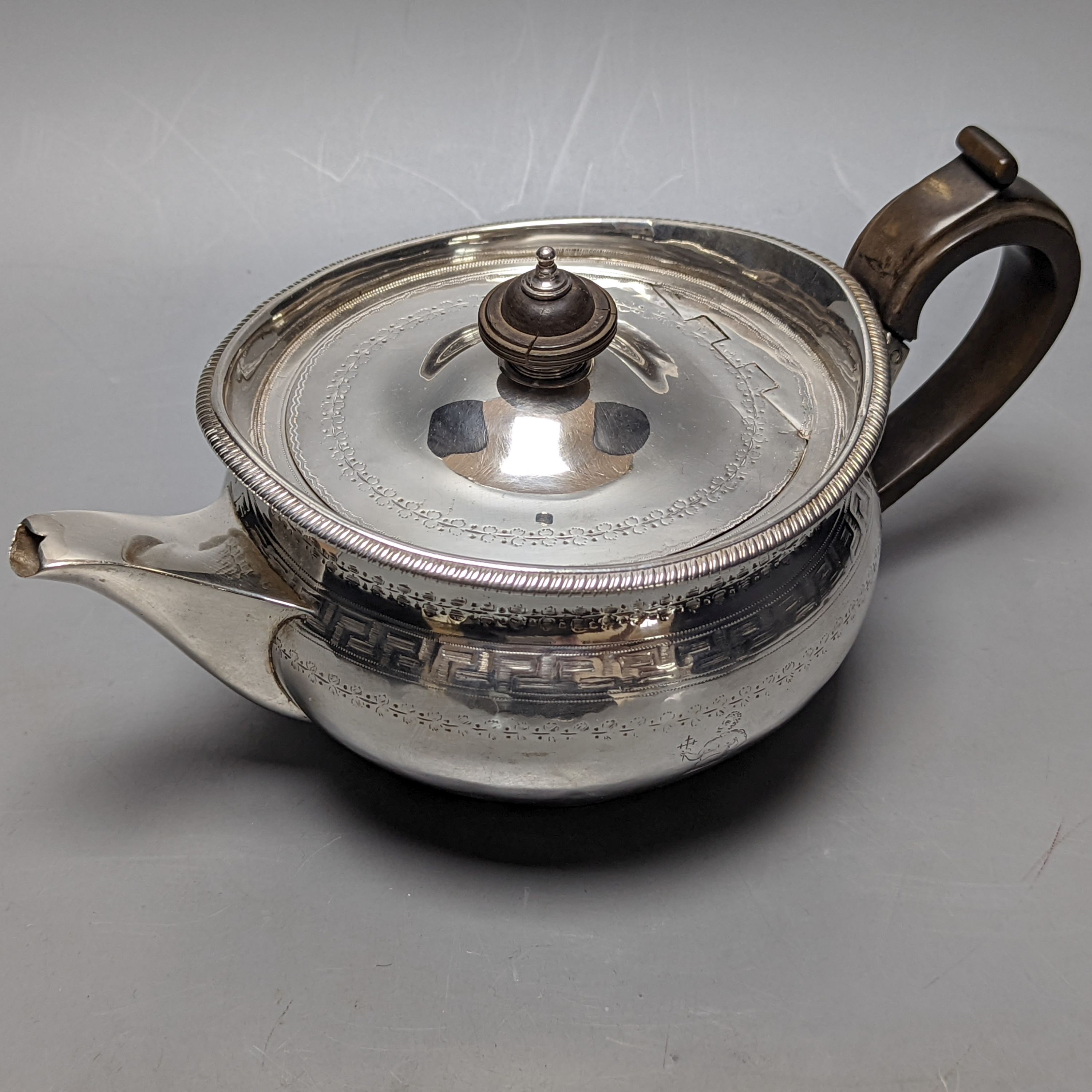 A George III engraved silver teapot, with crest, Robert & Samuel Hennell, London, 1802